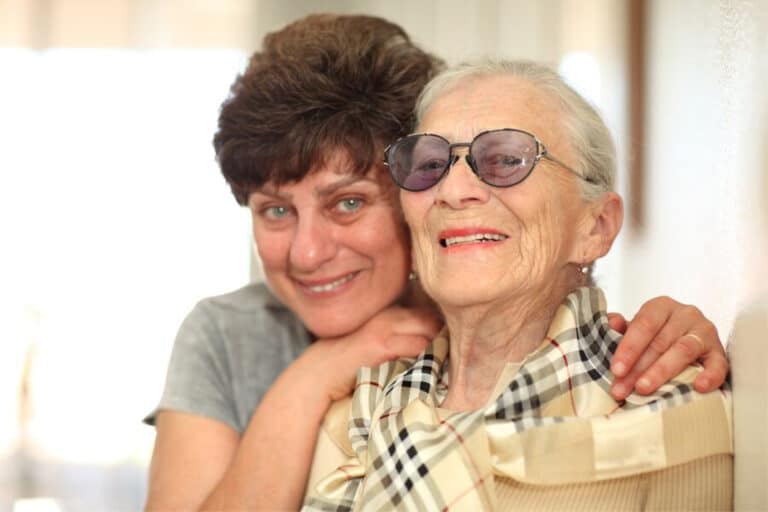 elderly woman with adult child