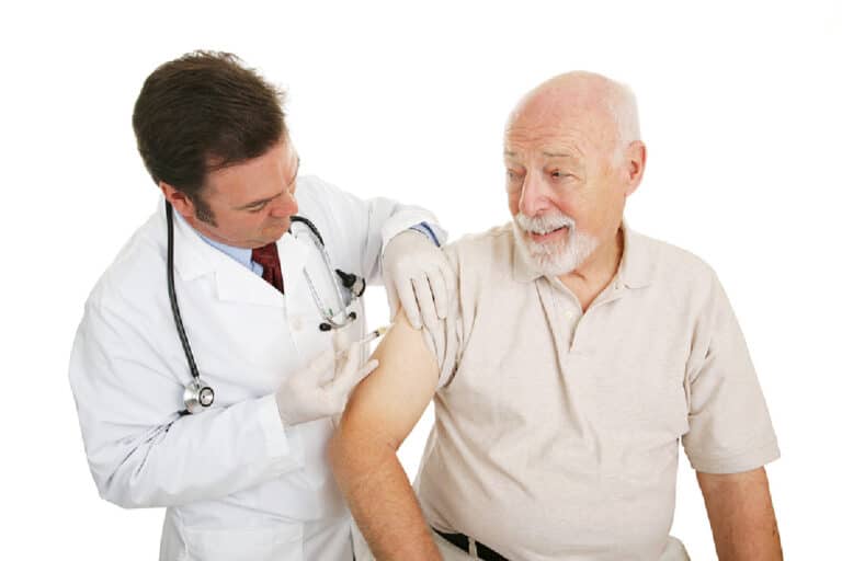 elderly man with doctor