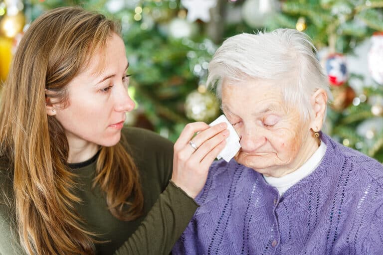 elderly person crying